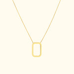 Gold necklace featuring a minimalist rectangular pendant on a delicate chain.