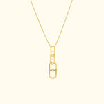 Gold chain necklace featuring a modern, interlocking link pendant.