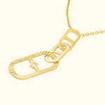 Gold necklace featuring a unique link design with a small diamond accent.