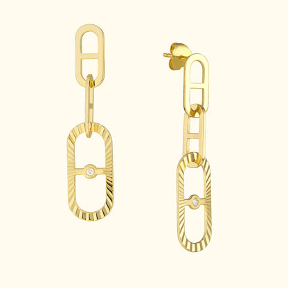 Gold drop earrings featuring linked rectangular shapes with a small diamond accent.