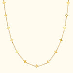 Gold chain necklace featuring star-shaped charms, elegantly spaced.