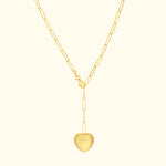 Gold heart pendant necklace on a delicate chain with elongated links.