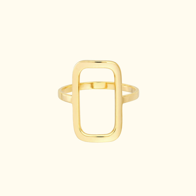 Sleek gold ring with a rectangular centerpiece and a minimalist design.