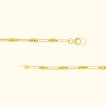 Gold chain bracelet with interconnected links and a lobster clasp.