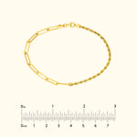 A gold bracelet featuring a mix of chain links and twisted design.