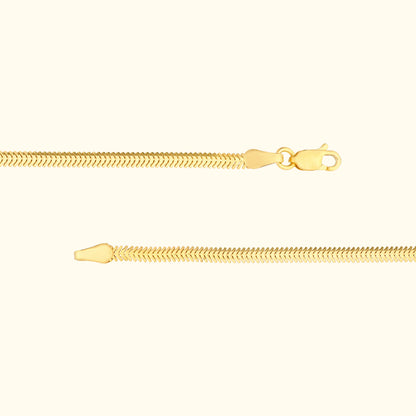 Delicate gold chain with a lobster clasp and textured links.