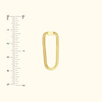 Gold chain link bracelet with a clasp, displayed against a light background.