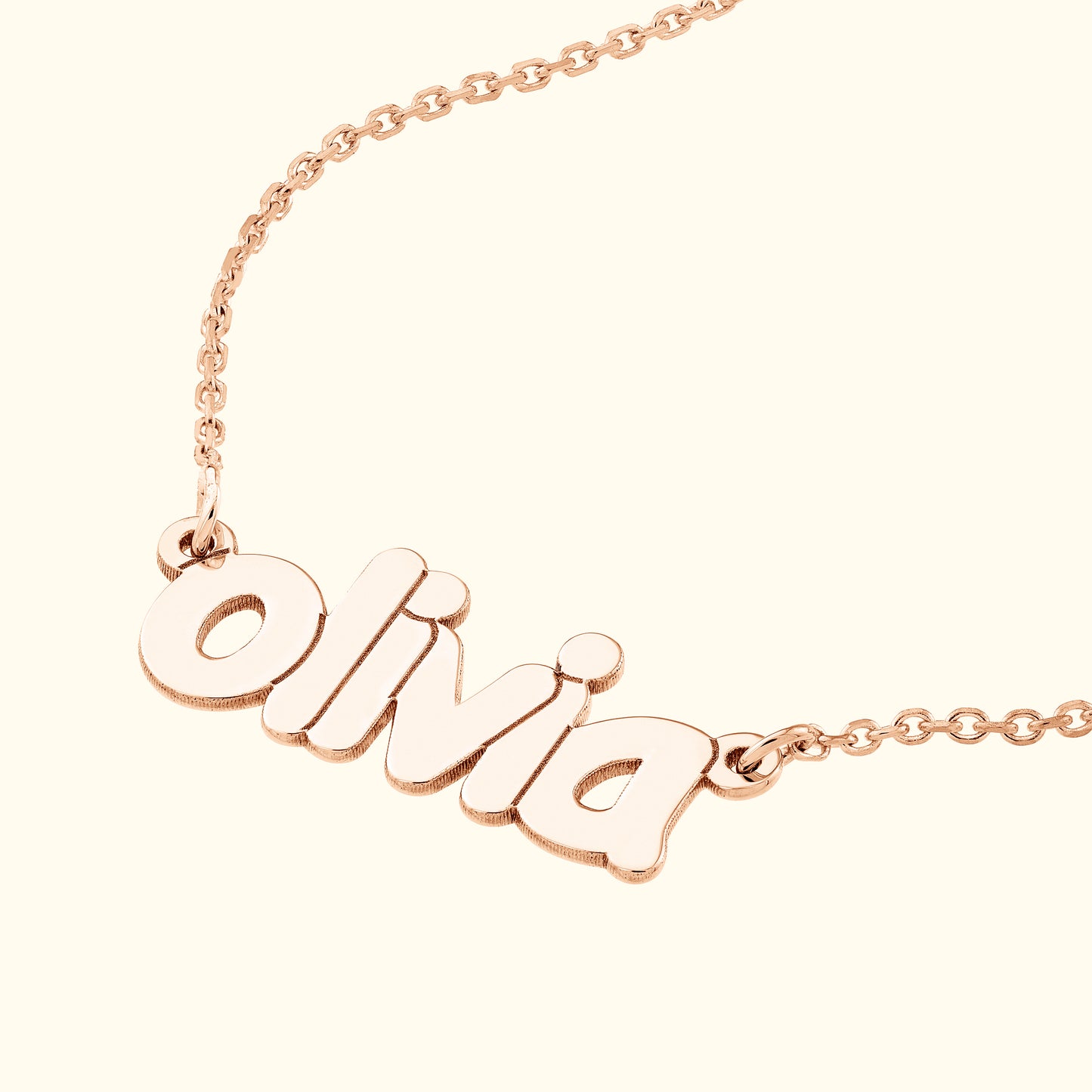 Rose gold necklace featuring the name "Olivia" in a stylish font.