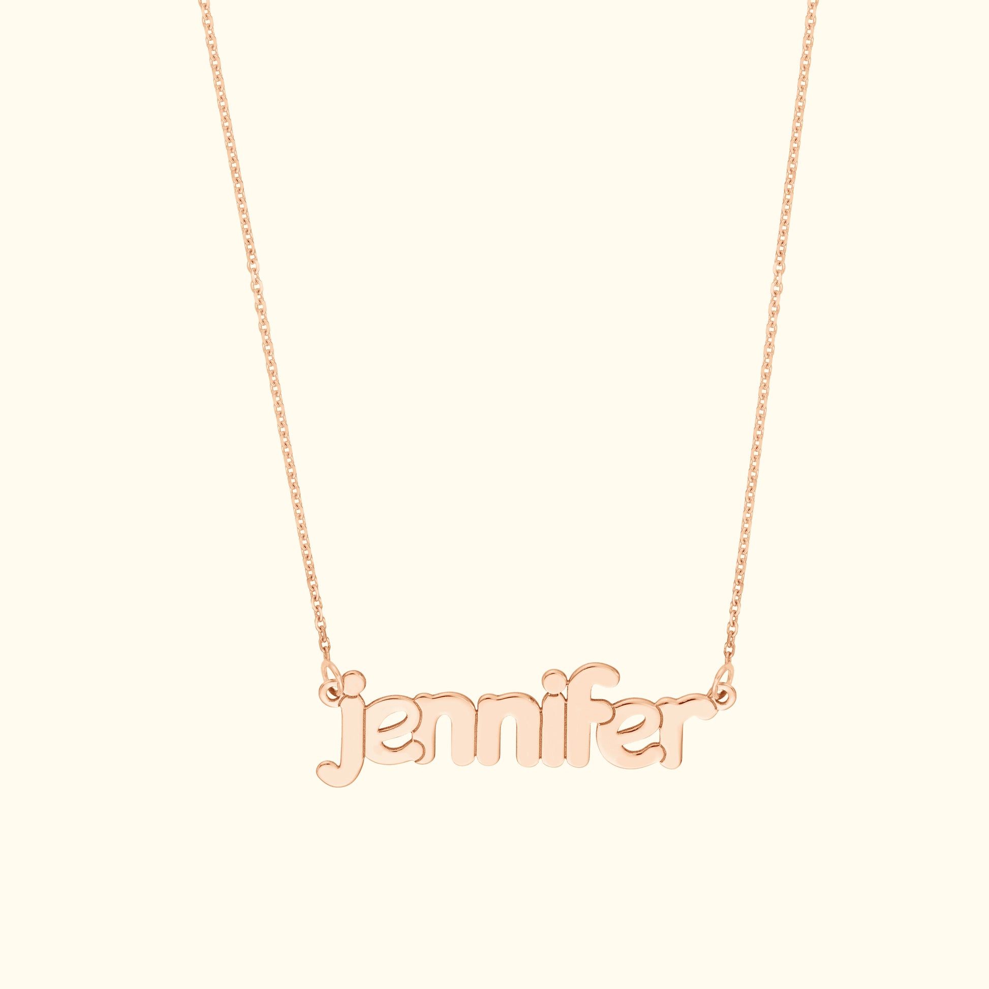 Personalized gold necklace featuring the name "Jennifer" in a stylish font.