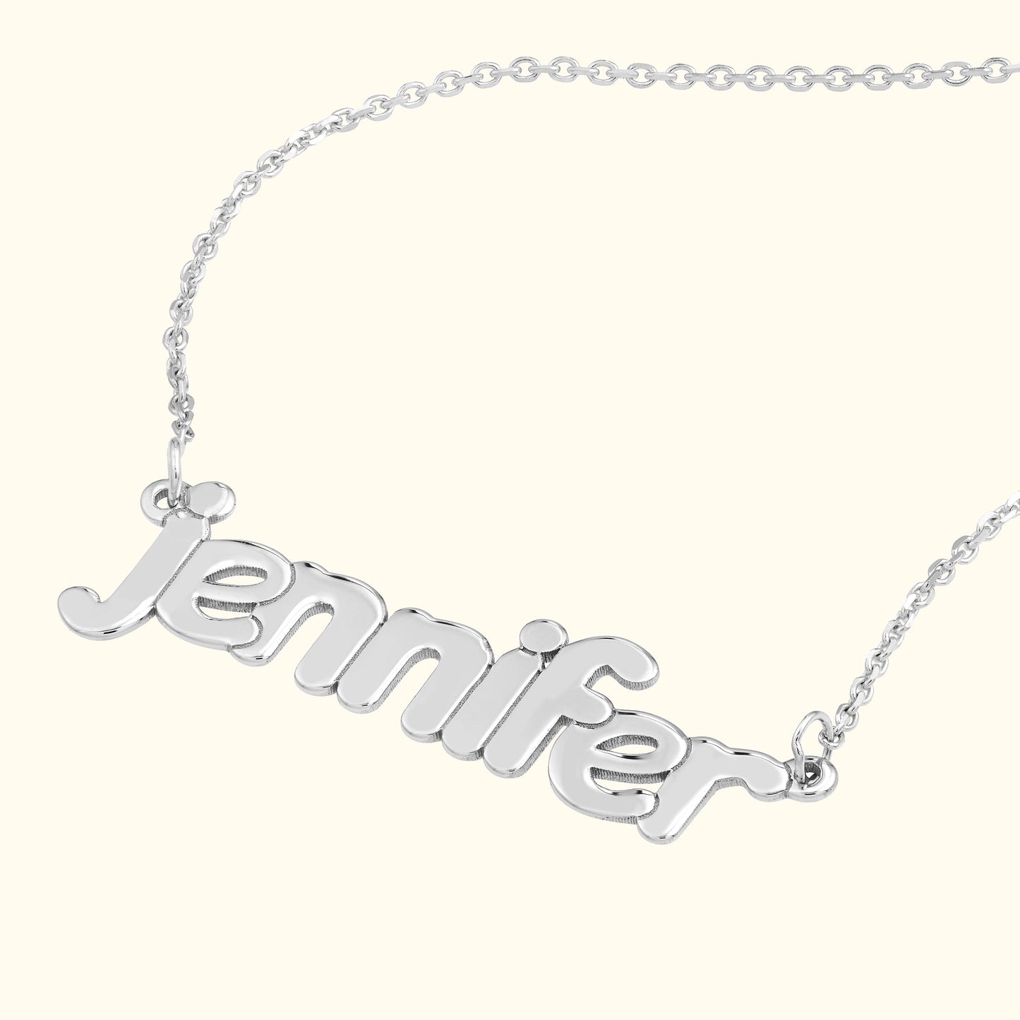 Silver name necklace with the word "jennifer" in a stylish font.