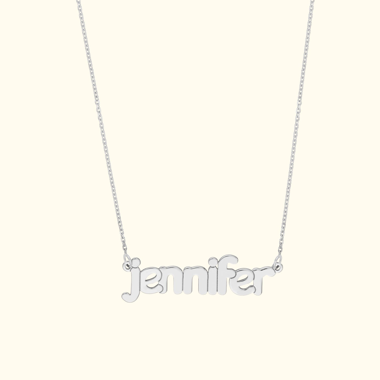 Silver necklace featuring the name "jennifer" in cursive letters.