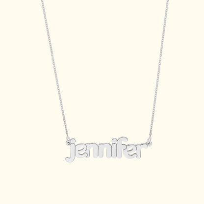 Silver necklace featuring the name "jennifer" in cursive letters.