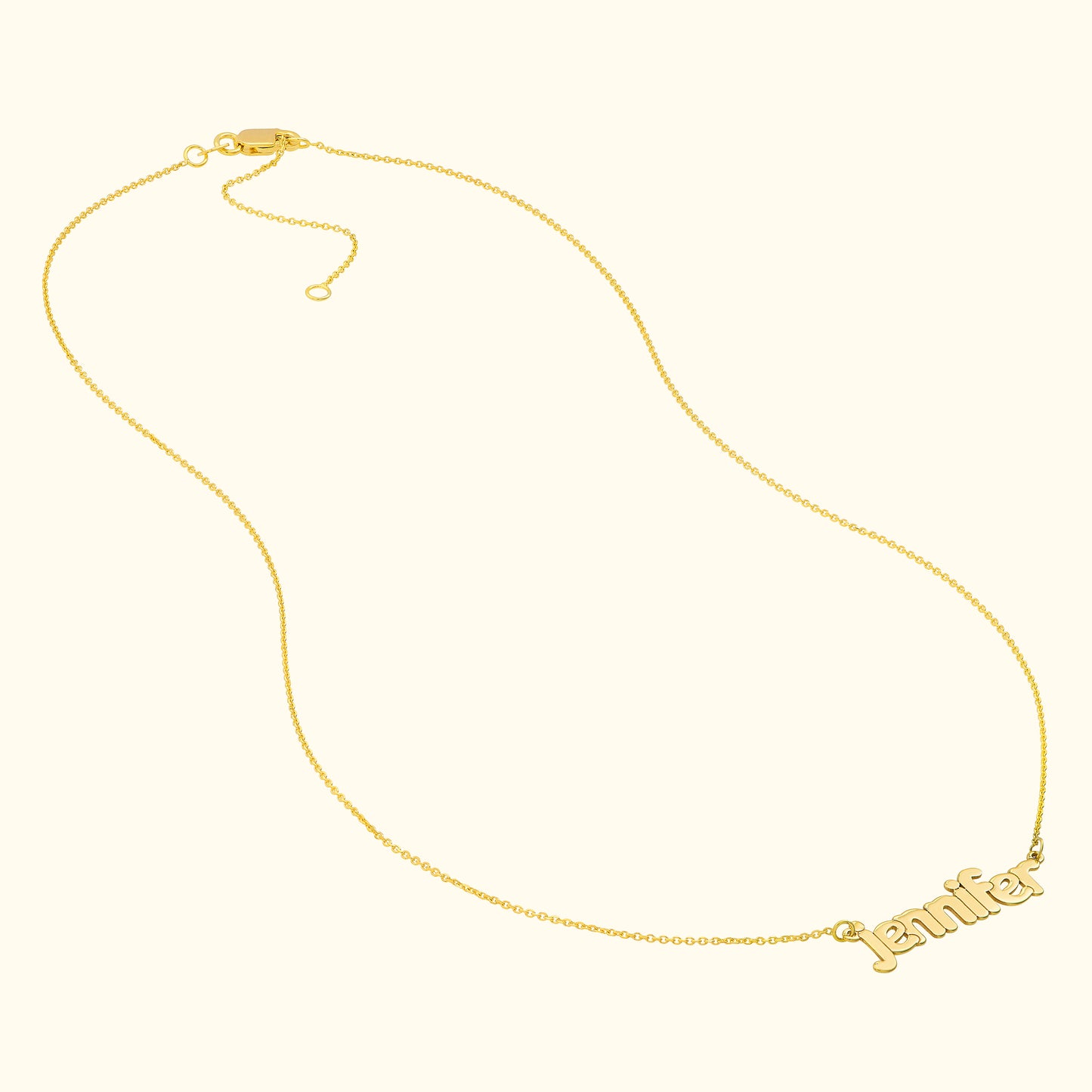 Gold name necklace with the name "Jennifer" displayed.