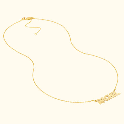 Gold personalized necklace featuring the name "RACHEL" in bold letters.