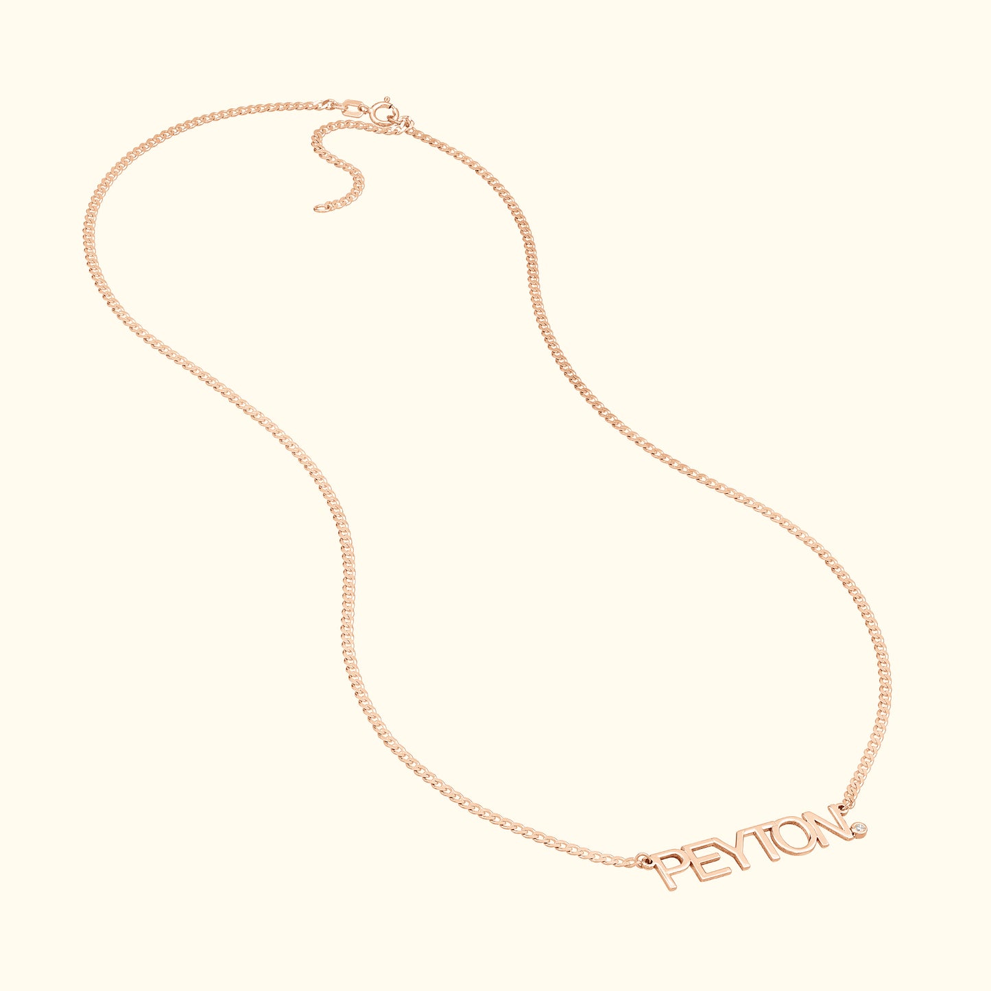 Rose gold necklace featuring the name "PEYTON" in a stylish, cursive font.