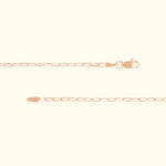 Delicate rose gold chain necklace with a simple clasp and elongated links.