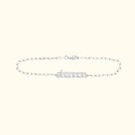 Silver name bracelet featuring the name "Shannon" in a decorative font.