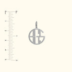 Silver monogram pendant featuring the letters A, G, and S, with a loop for attachment.