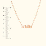 Rose gold necklace featuring the name "kristin" in a decorative font with a ruler for size reference.