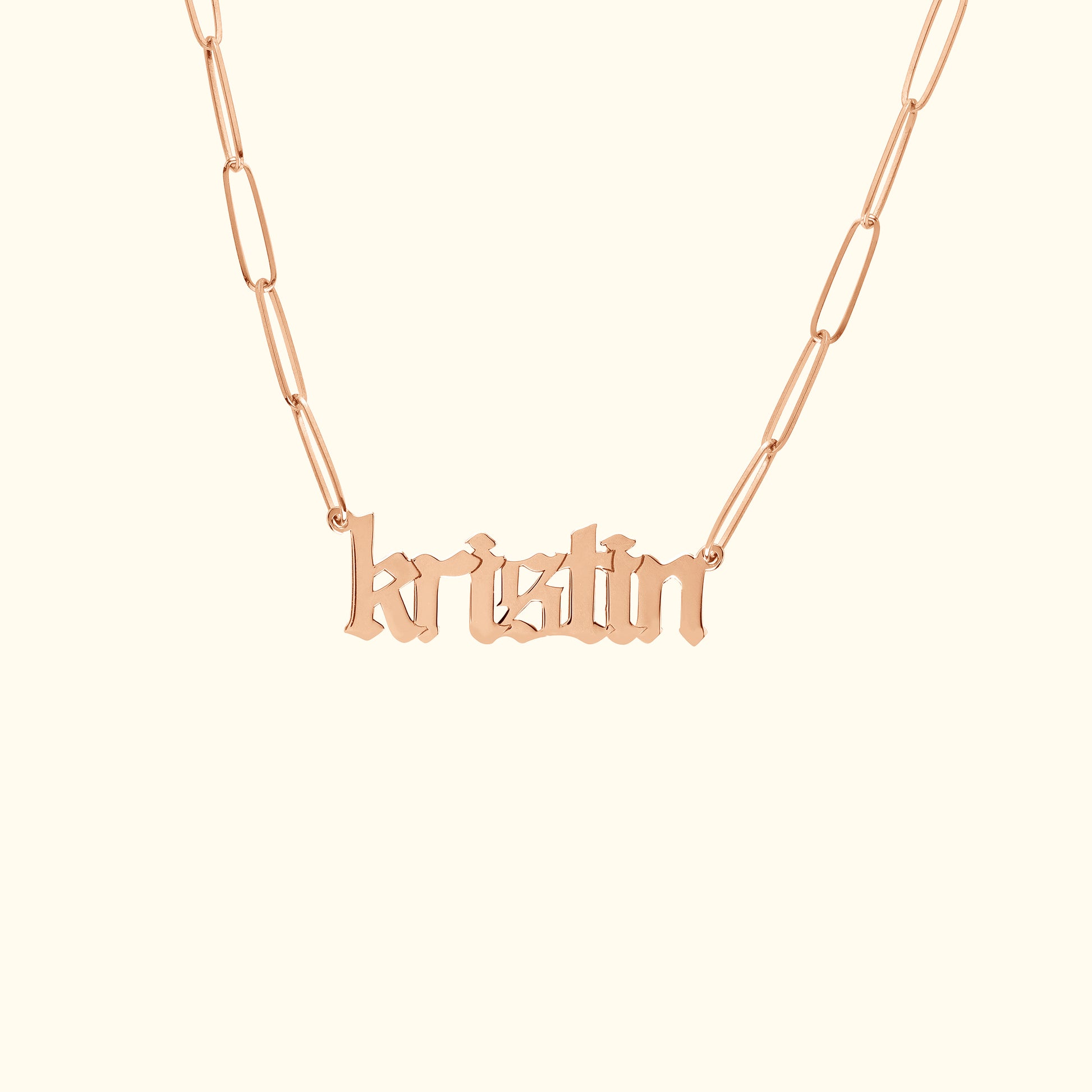 Rose gold necklace featuring a name pendant styled as "kristin".