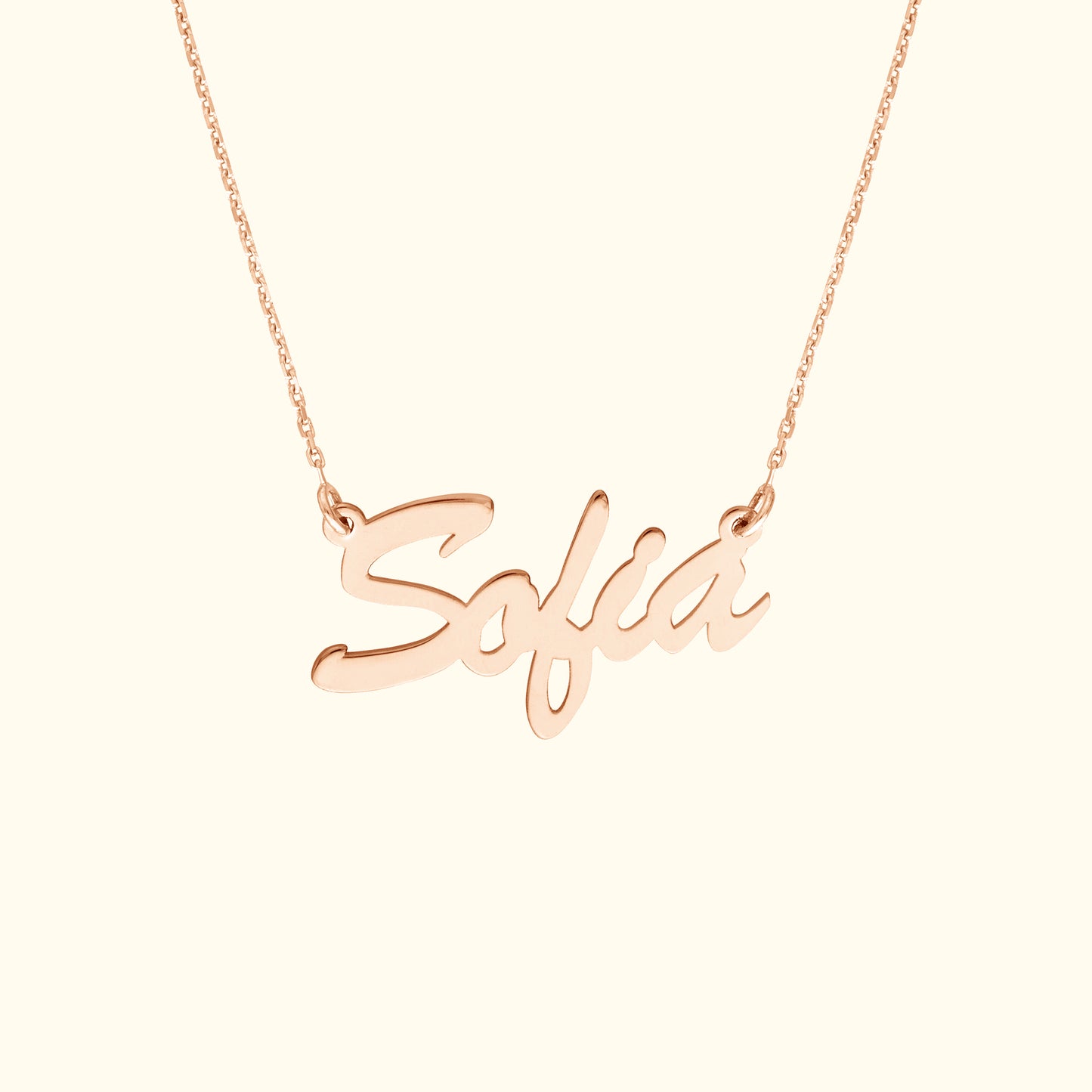 Rose gold necklace featuring the name "Sofia" in a stylish cursive font.