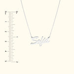 Silver pendant necklace with the name "Sofia," shown with a ruler for scale.
