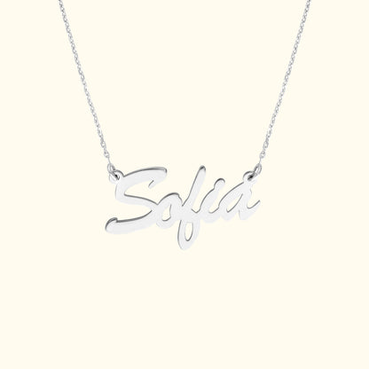 Silver necklace featuring a cursive nameplate that reads "Sofia."