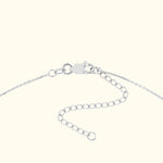 Delicate silver chain with a clasp and adjustable links.