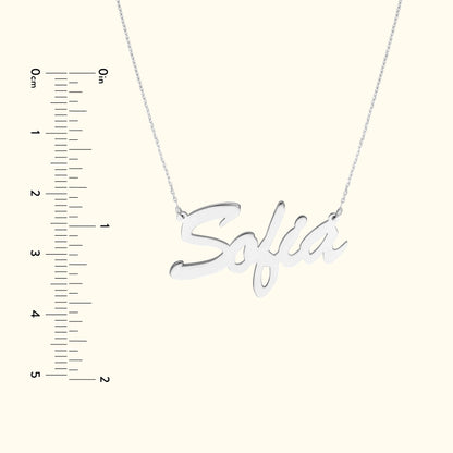 Stylish silver name necklace with the name "Sofia" in cursive lettering.