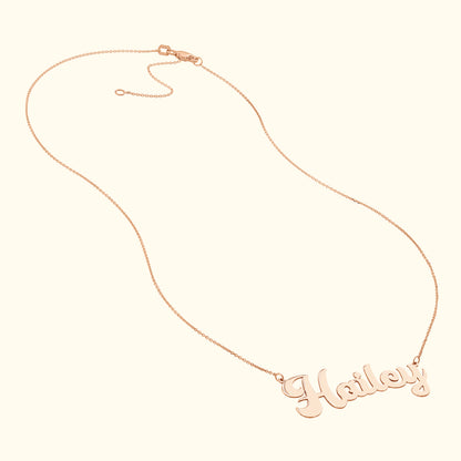 Rose gold necklace featuring the name "Hailey" in a cursive font.