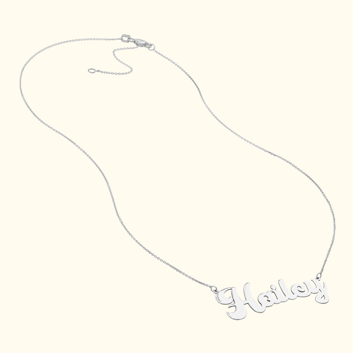 Silver personalized name necklace featuring the name "Hailey" in cursive.