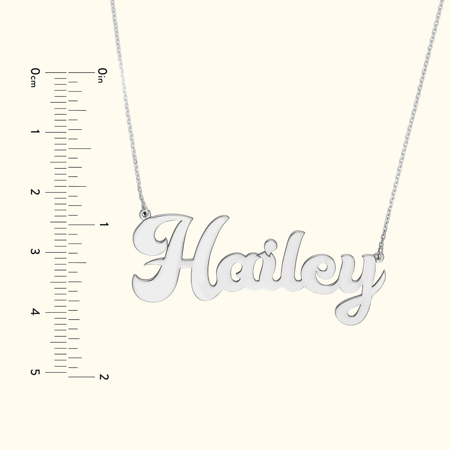 Silver necklace featuring the name "Hailey" in elegant, flowing script.