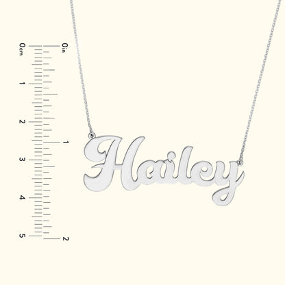 Silver necklace featuring the name "Hailey" in elegant, flowing script.