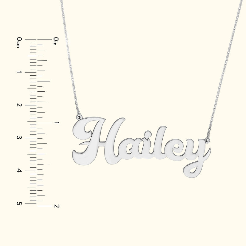 Silver necklace featuring the name "Hailey" in elegant, flowing script.