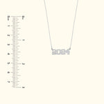 Silver necklace featuring the numbers "2024" as the pendant.