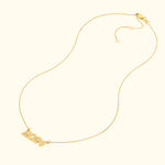 Gold necklace featuring the year "2024" as the central pendant.