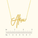 Gold necklace featuring a custom cursive name pendant "Alexx" on a light background.