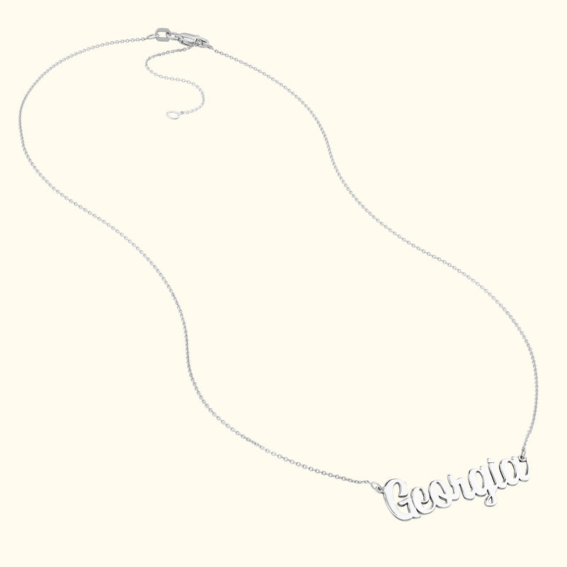 Silver necklace featuring the name "Georgia" in a cursive font.