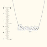 Silver necklace featuring the name "Georgia" in a cursive font.