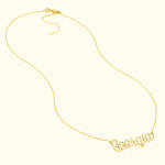 Gold necklace featuring the name "Georgia" in a cursive font.