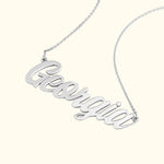 Silver necklace with the name "Georgia" in a cursive font.