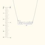 Silver name necklace with "Georgia" pendant on a delicate chain.