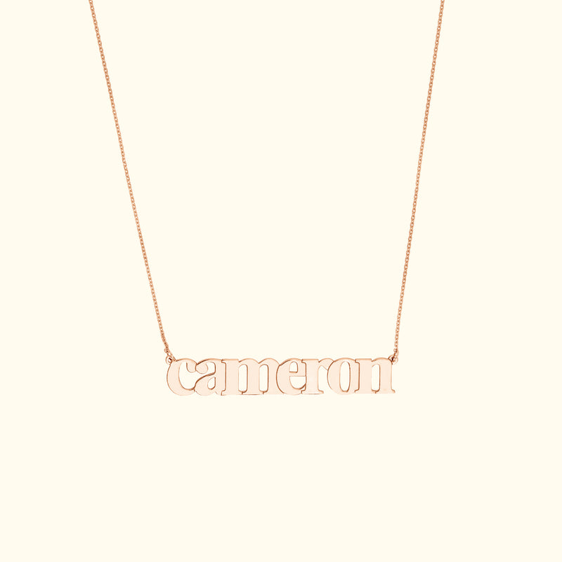 Rose gold necklace featuring the name "Cameron" in a stylish font.