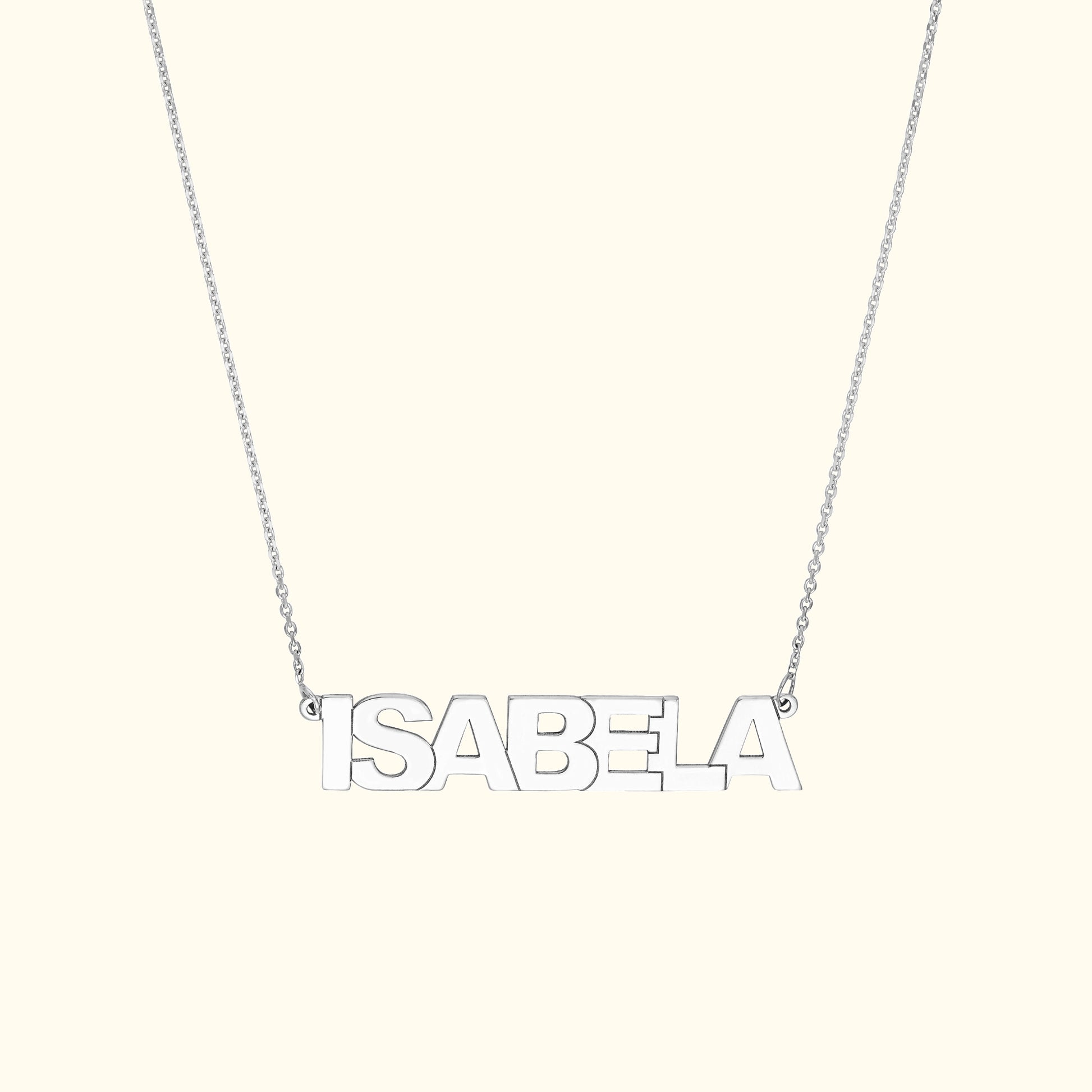 Silver necklace featuring the name "ISABELA" in bold capital letters.