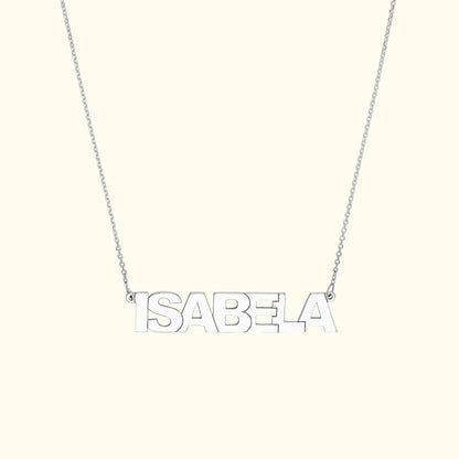 Silver necklace featuring the name "ISABELA" in bold capital letters.