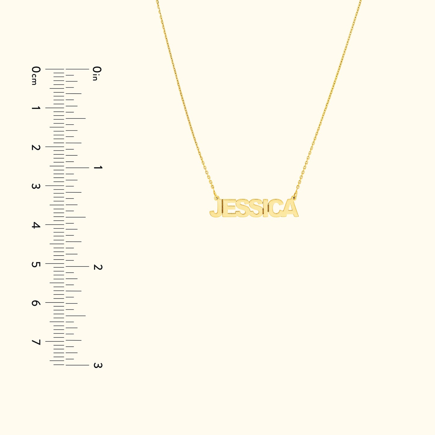 Yellow gold name necklace with the name "JESSICA" displayed prominently.