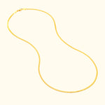 Sleek gold chain necklace displayed against a light background.