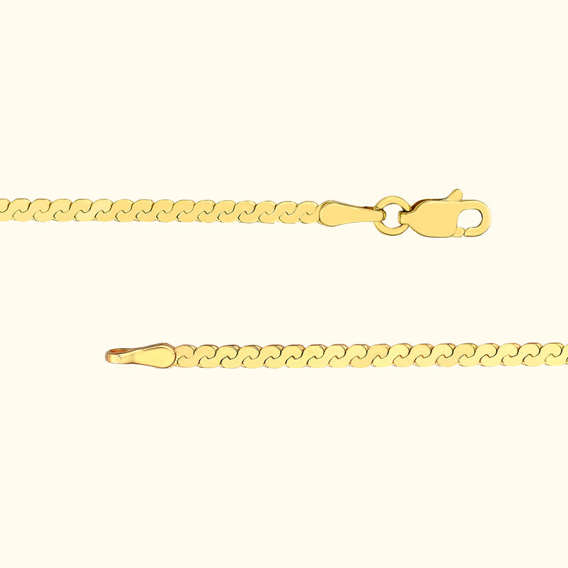 Glossy yellow gold chain bracelet with a secure clasp at one end.