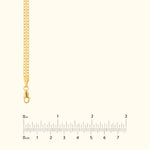 Golden chain necklace with a lobster clasp, displayed with a measurement ruler below.