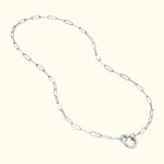 Silver chain necklace with elongated links and a circular clasp.